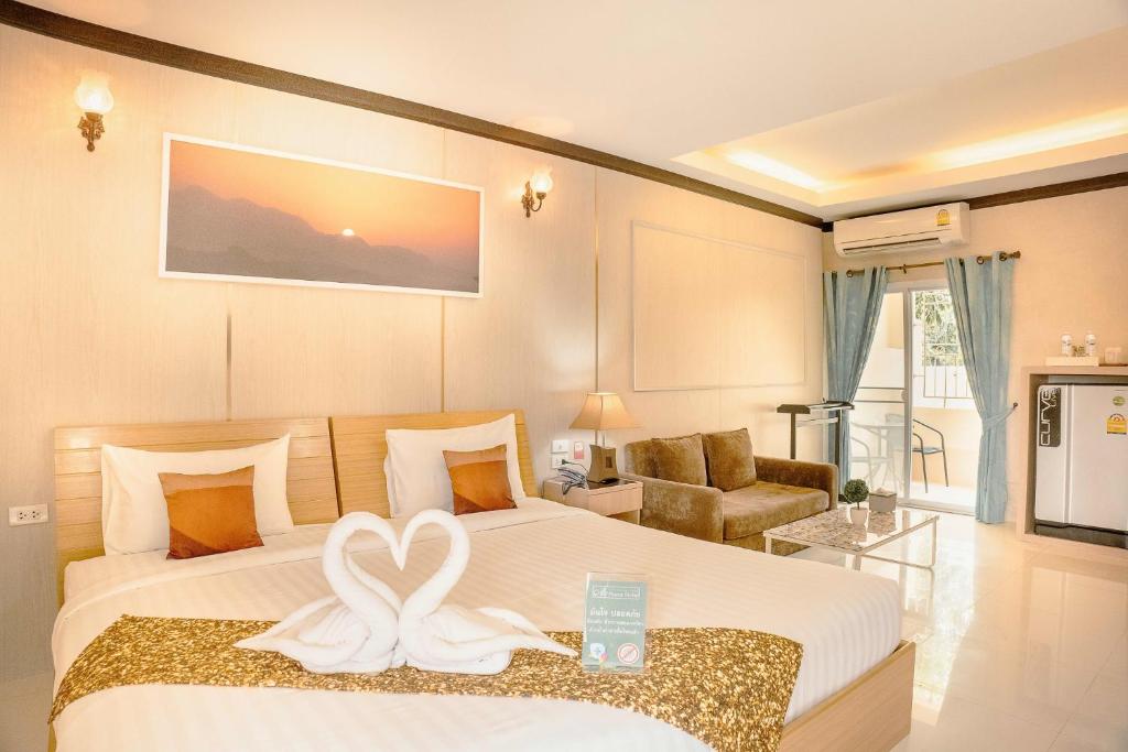Kuchyň nebo kuchyňský kout v ubytování AU Place Hotel