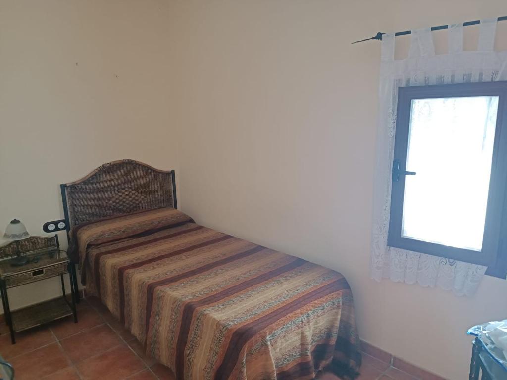 Postel nebo postele na pokoji v ubytování Cal Espardanyer