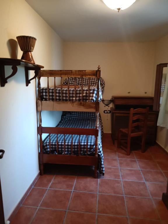 Postel nebo postele na pokoji v ubytování Cal Espardanyer