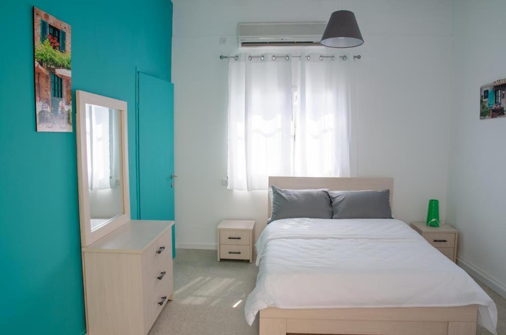 Postel nebo postele na pokoji v ubytování Apartments BU93