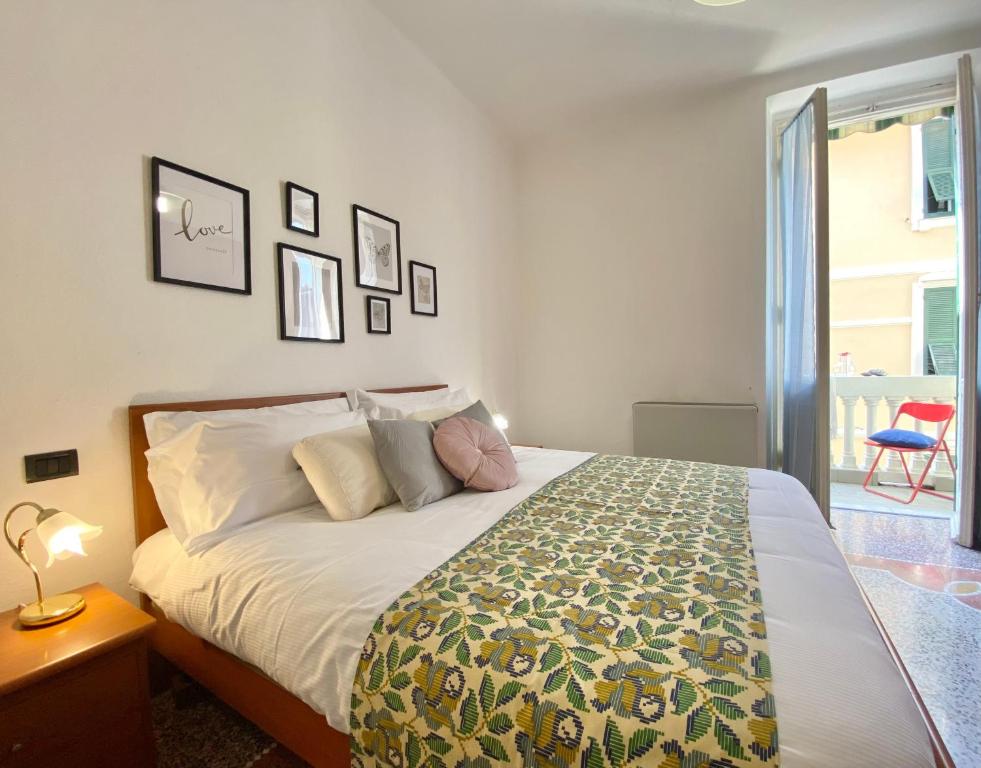 Кровать или кровати в номере CasaViva - Trilo with parking in Sestri Levante