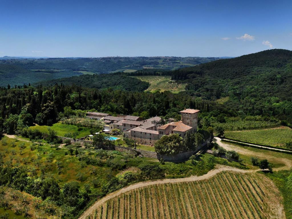 an aerial view of a house in a vineyard at Castello di Cafaggio in Impruneta