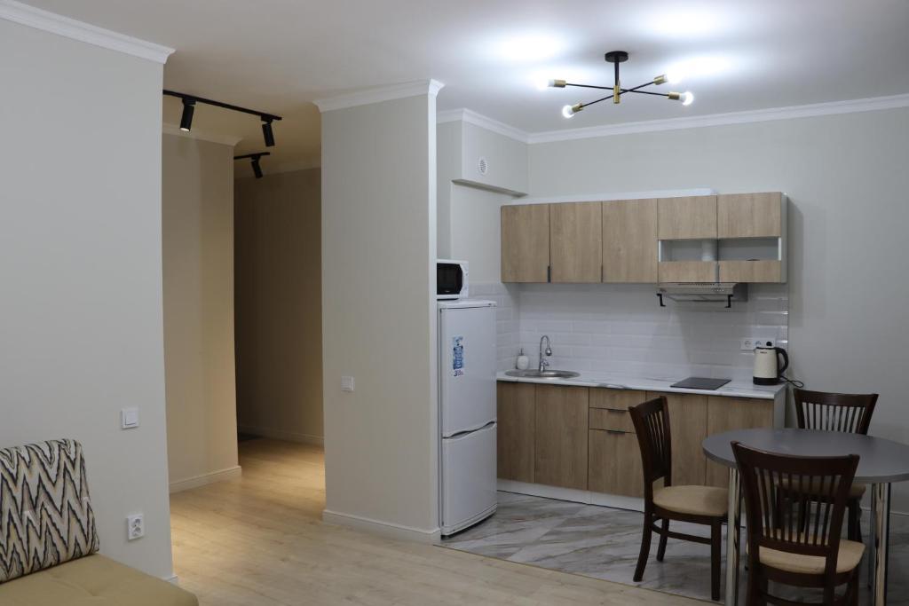 تصویر اتاق‌های Cozy Modern Auezov City Apt - تصویر ۲
