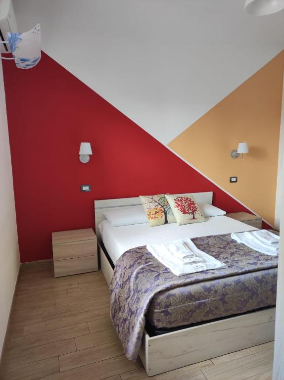 Postel nebo postele na pokoji v ubytování B&B Lara Santola