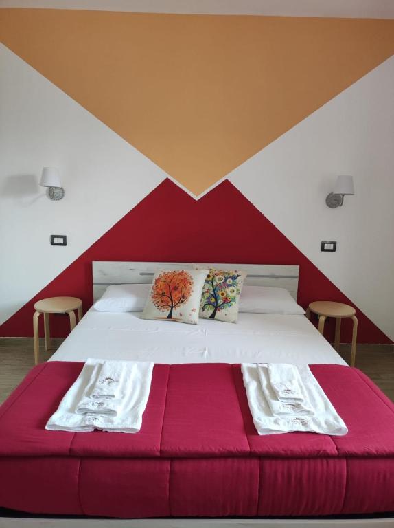 Postel nebo postele na pokoji v ubytování B&B Lara Santola