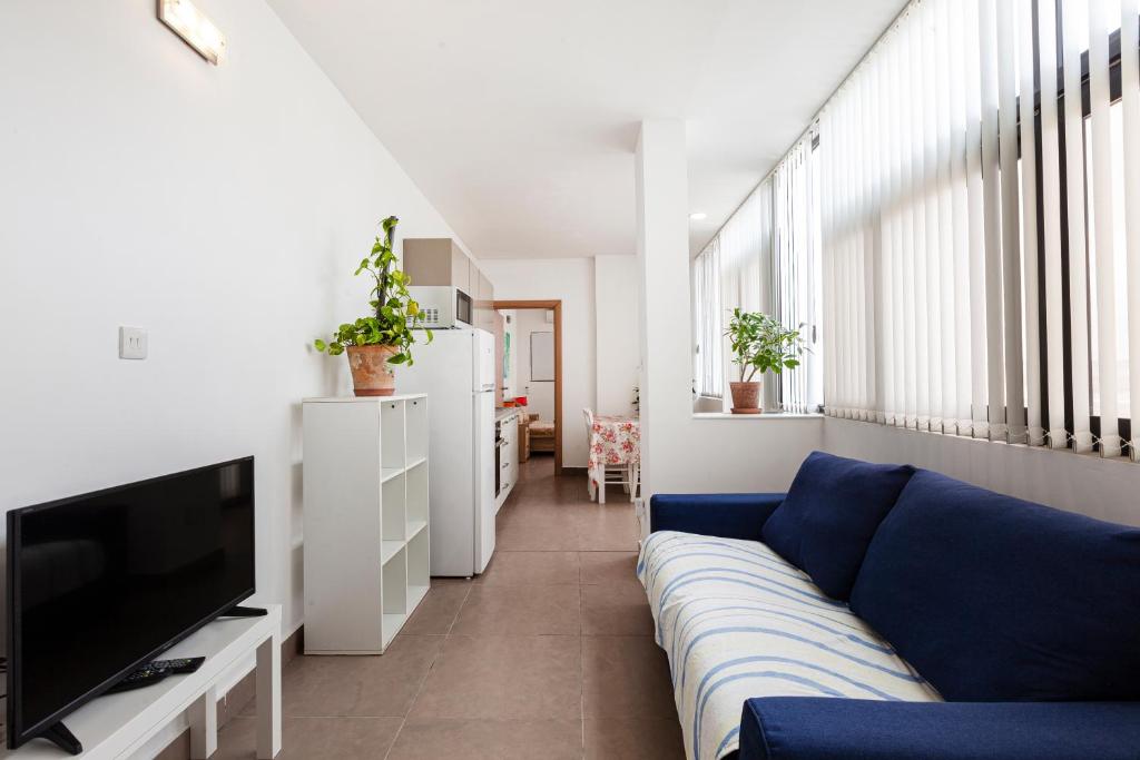 TV a/nebo společenská místnost v ubytování Perfect Seaview Penthouse