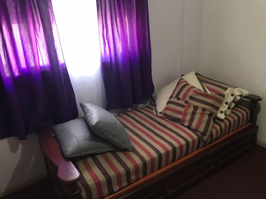 Tempat tidur dalam kamar di Habitacion Super Comoda en Casa Particular