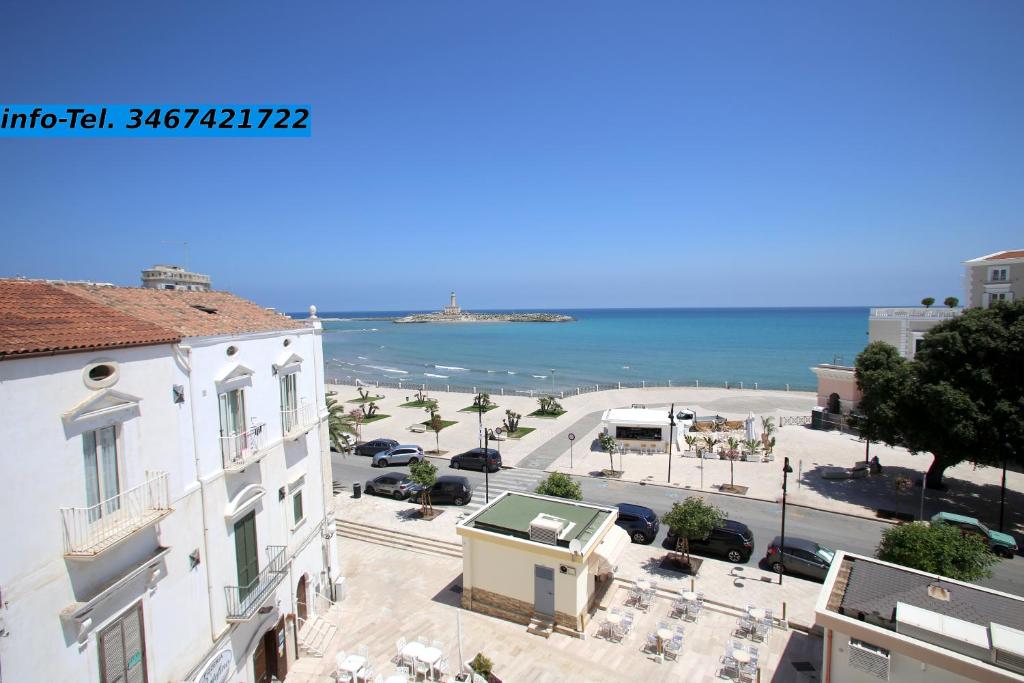 a view of the ocean from a building at Appartamenti Luce Vieste in Vieste