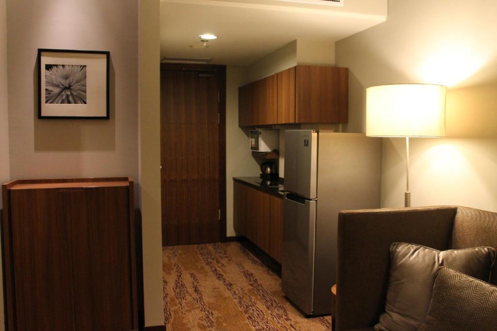 Kuchyň nebo kuchyňský kout v ubytování I Hotel Baloi Batam