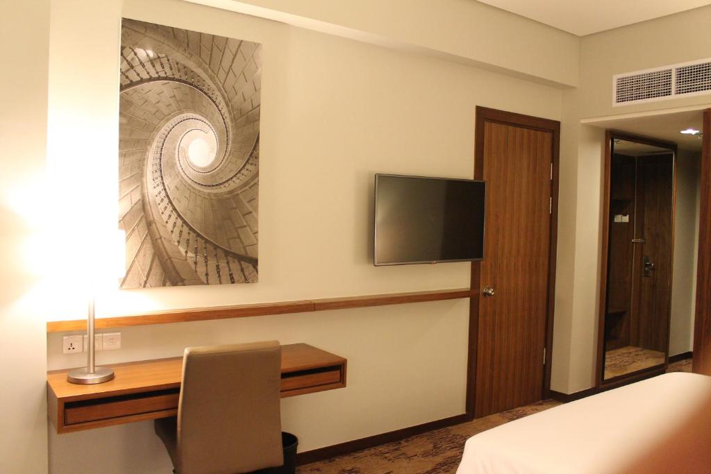 TV a/nebo společenská místnost v ubytování I Hotel Baloi Batam