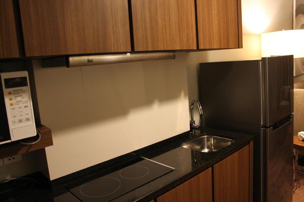 Kuchyň nebo kuchyňský kout v ubytování I Hotel Baloi Batam