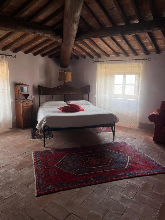 Postel nebo postele na pokoji v ubytování Hotel Relais Palazzo di Luglio