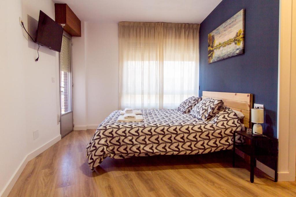 Postel nebo postele na pokoji v ubytování MyWay Albergue de Peregrinos