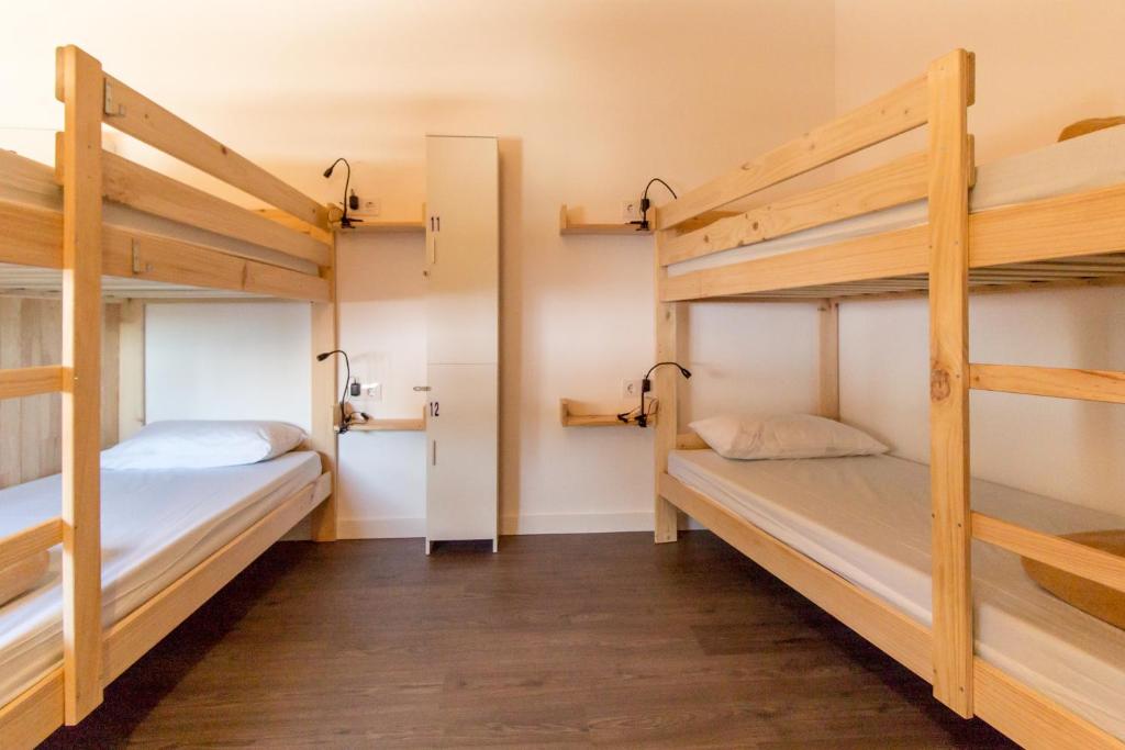 Postel nebo postele na pokoji v ubytování MyWay Albergue de Peregrinos