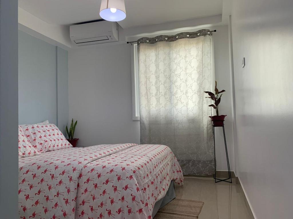 Postel nebo postele na pokoji v ubytování Cebu Mini Hotel