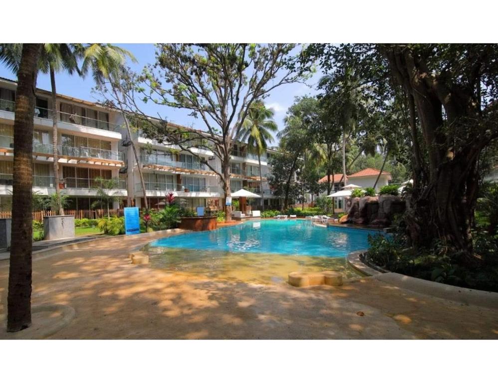 Бассейн в Aarju Luxurious Stay Calangute или поблизости