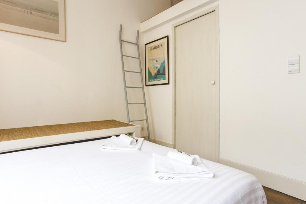 Posteľ alebo postele v izbe v ubytovaní Appartement Gardague - 2 étoiles - Welkeys