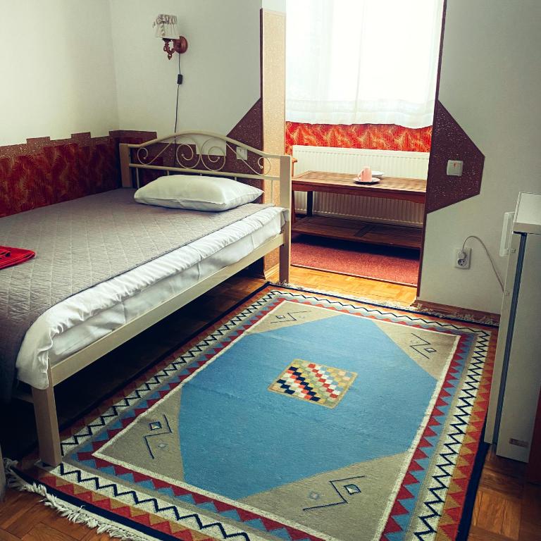 Postel nebo postele na pokoji v ubytování Malvy hotel