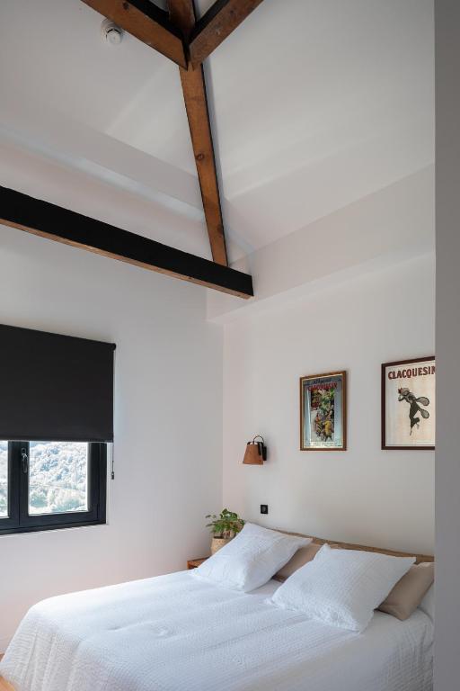 Postel nebo postele na pokoji v ubytování Auberge hiribarren
