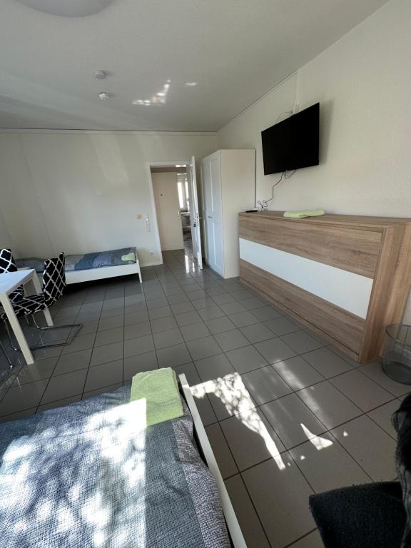 TV a/nebo společenská místnost v ubytování Gästezimmer - Elbert