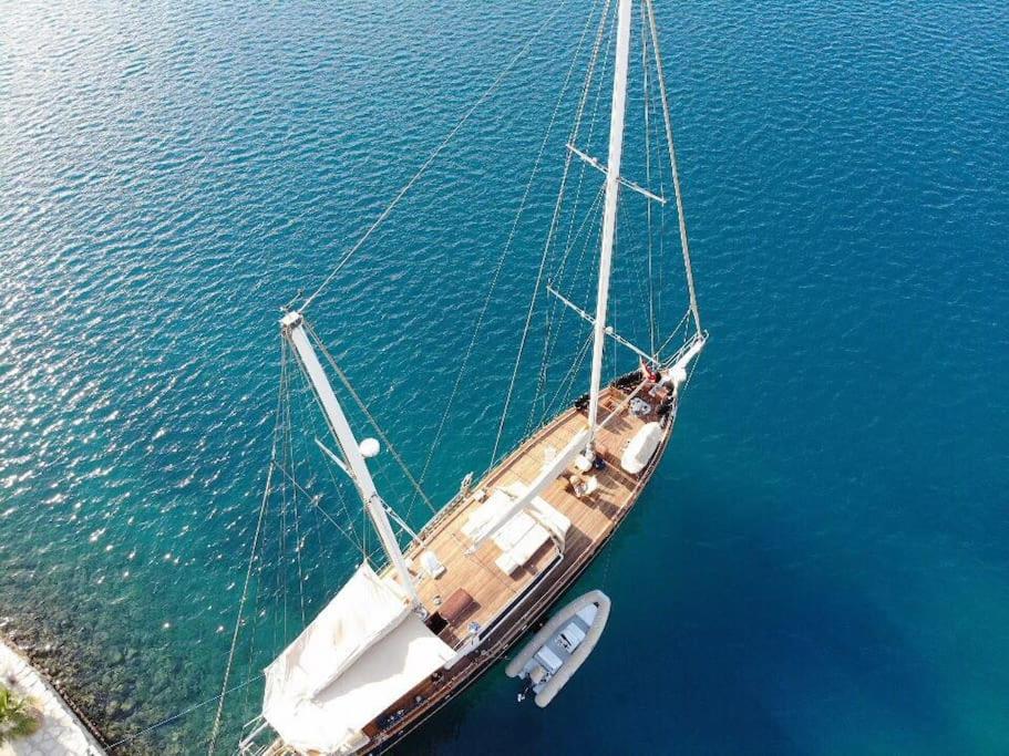 a boat floating in the water in the ocean at AsterixYacht-navigate to Greece,Turkey and so more in Marmaris