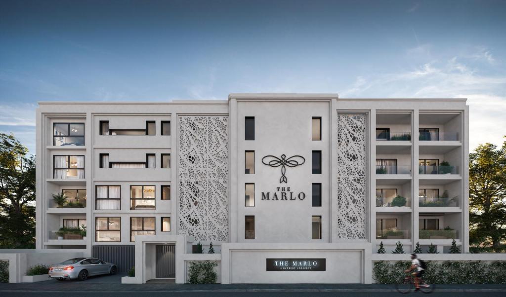 eine architektonische Darstellung des Apartmentgebäudes im Yachthafen in der Unterkunft The Marlo Luxury Suites by Totalstay in Kapstadt
