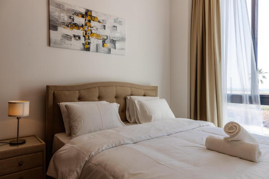 Voodi või voodid majutusasutuse Luxury Villas with Beach Access by VB Homes toas