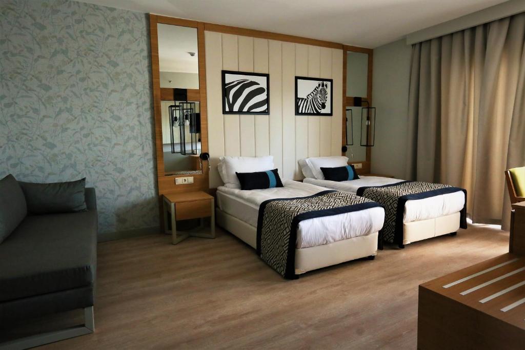 Postel nebo postele na pokoji v ubytování Calido Maris Hotel Ultra All Inclusive