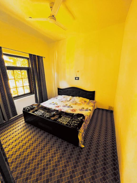 Postel nebo postele na pokoji v ubytování Sea Green Guest House