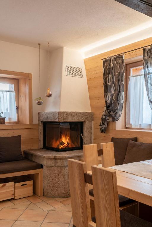 Posedenie v ubytovaní Casera Moda Luxury Chalet