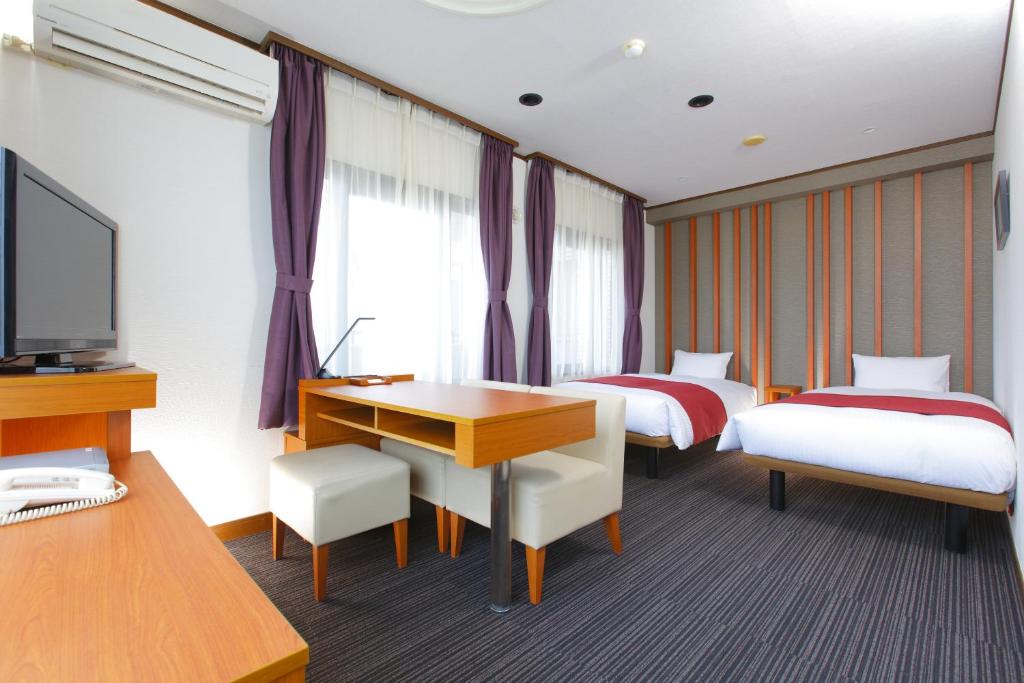 TV a/nebo společenská místnost v ubytování HOTEL MYSTAYS Kameido