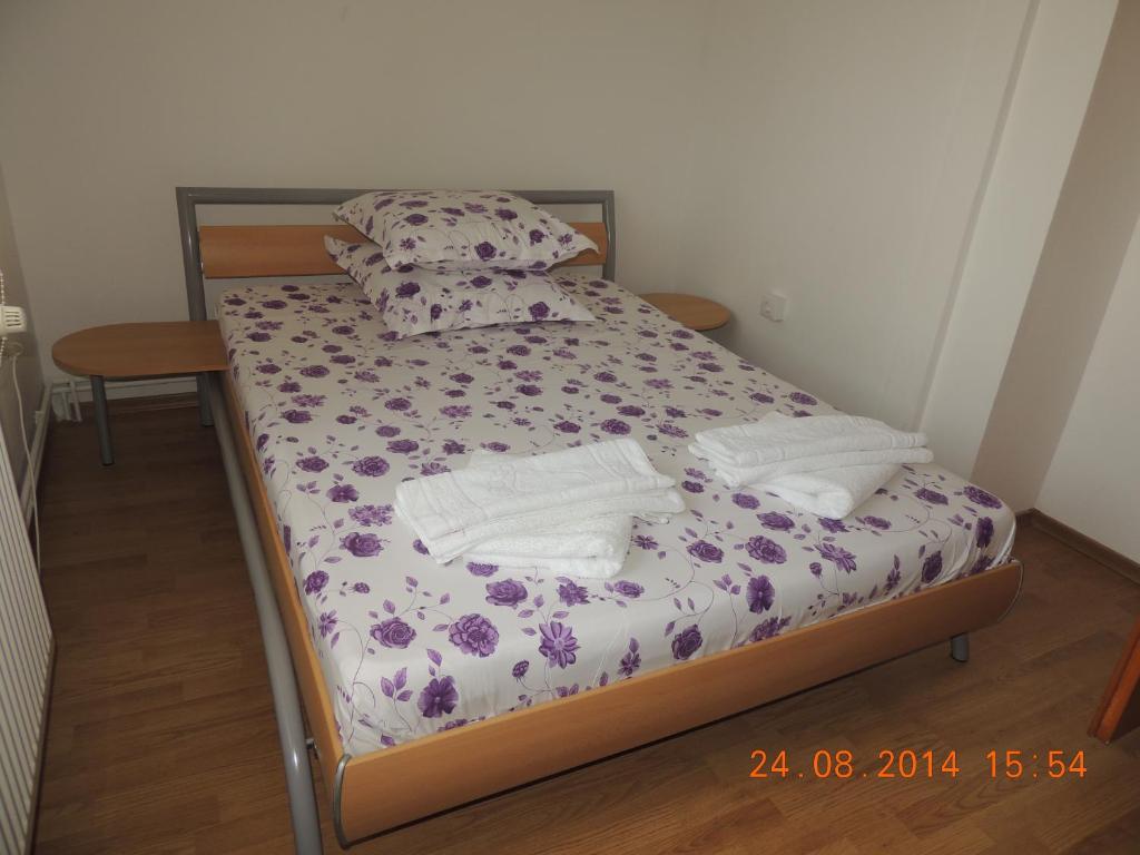 Postel nebo postele na pokoji v ubytování Pensiunea Iulia Sulina