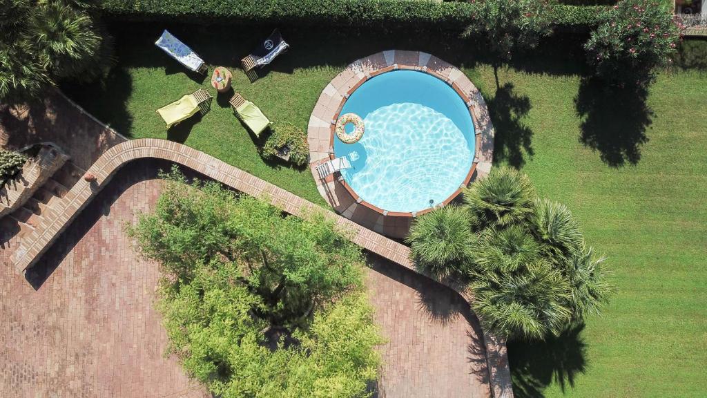 an overhead view of a swimming pool in a park at Villa Patrizia in Minturno