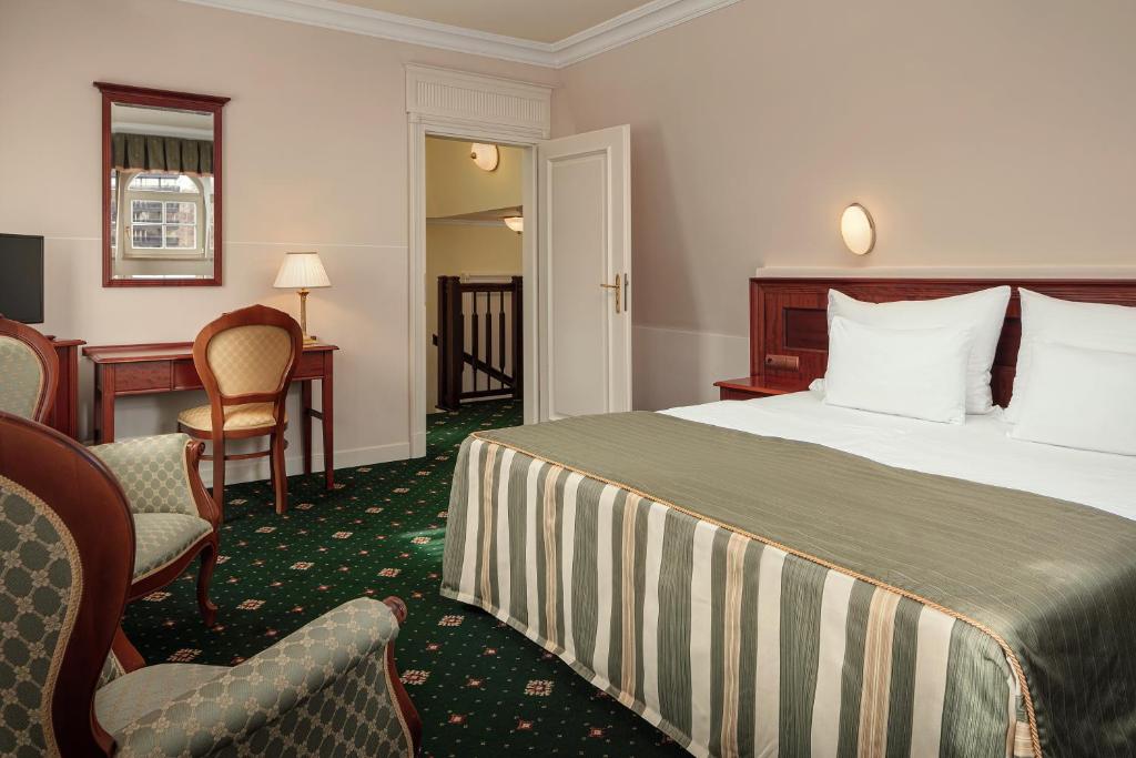 Postel nebo postele na pokoji v ubytování Humboldt Park Hotel & Spa