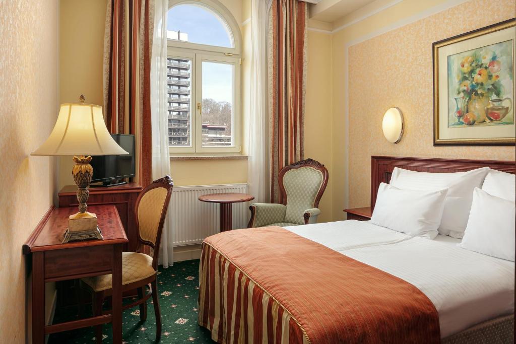 Postel nebo postele na pokoji v ubytování Humboldt Park Hotel & Spa