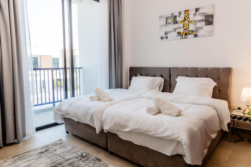 Voodi või voodid majutusasutuse Luxury Villas with Beach Access by VB Homes toas