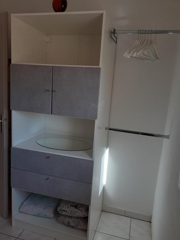 a small kitchen with a white refrigerator in a room at Bompastor in Bompas