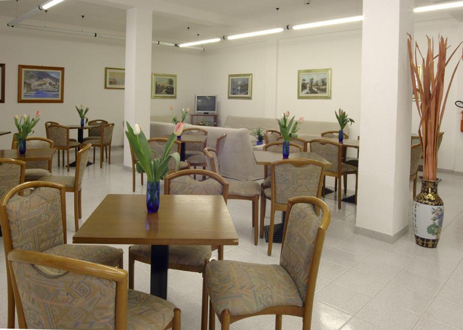 Posezení v ubytování Hotel Le Palme