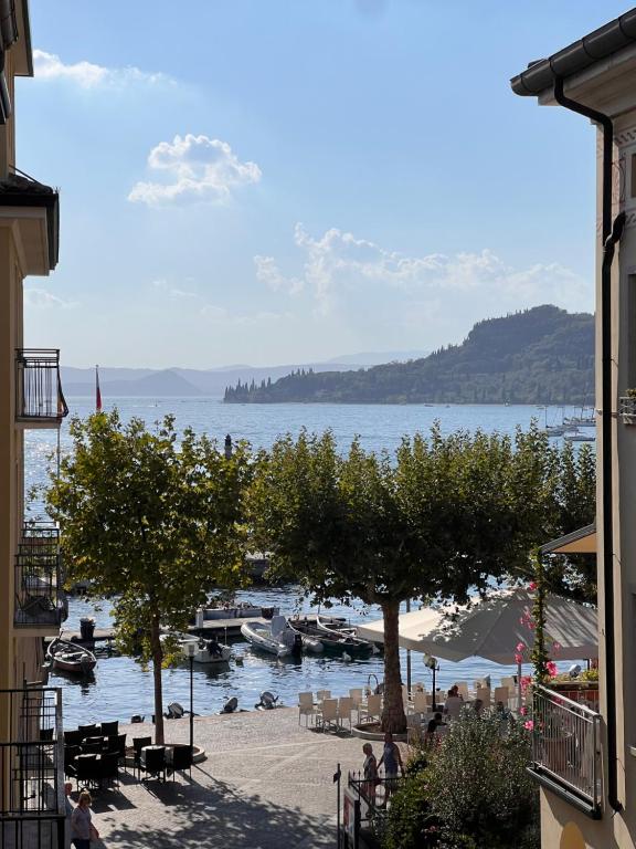 a view of a harbor with boats in the water at Welcome Traveller CHARMING EVA APARTMENT in Garda