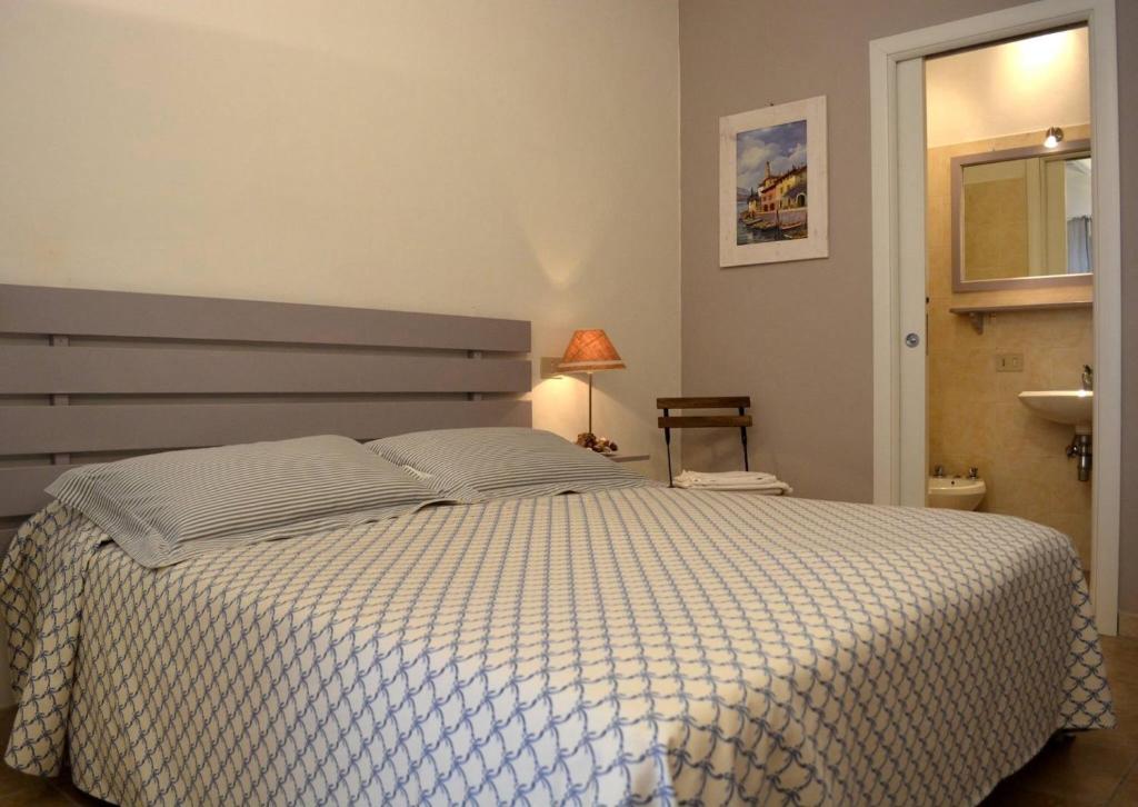 Postel nebo postele na pokoji v ubytování Villa Ghirardelli
