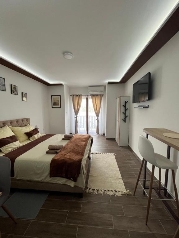 Postel nebo postele na pokoji v ubytování Apartman S2