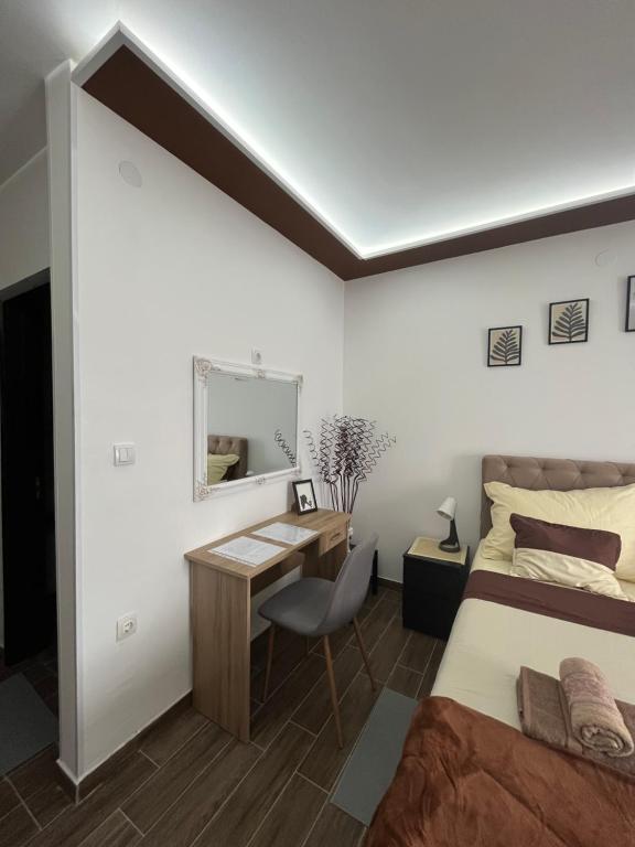 Postel nebo postele na pokoji v ubytování Apartman S2