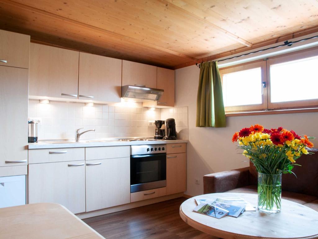 Kuchyň nebo kuchyňský kout v ubytování Gaestehaus Webermohof