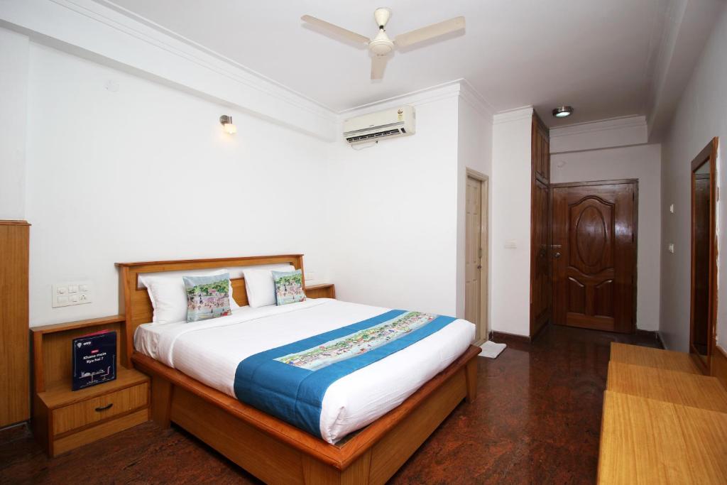 Voodi või voodid majutusasutuse Mahendra Hotel toas