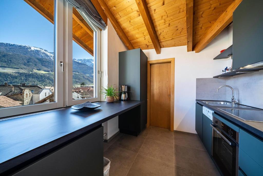 Kuchyň nebo kuchyňský kout v ubytování Apartment Luisa