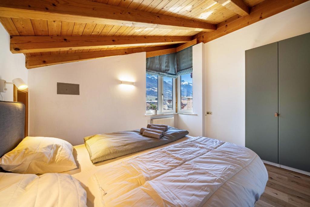 Postel nebo postele na pokoji v ubytování Apartment Luisa