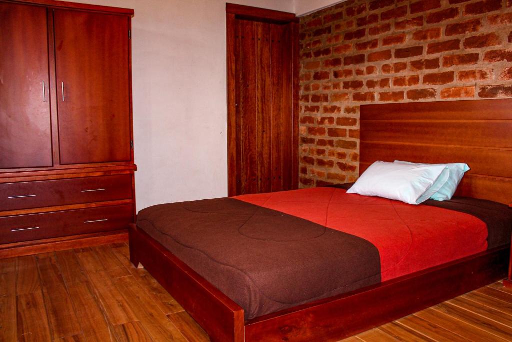 Postel nebo postele na pokoji v ubytování Comunidad La Moya, Calpi