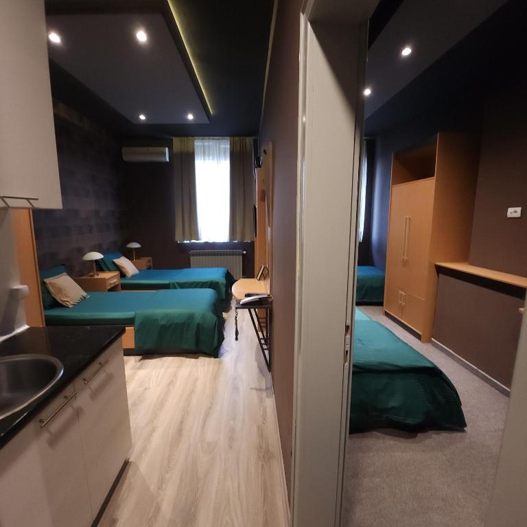 IN CLUB - Deluxe Quadruple Room