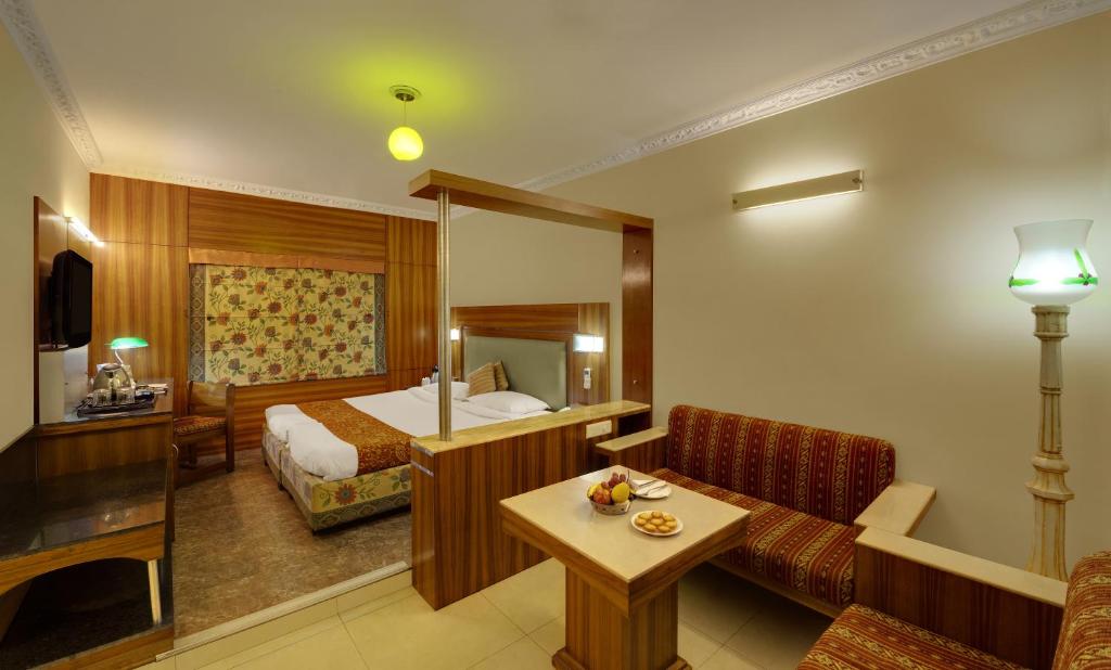 Postel nebo postele na pokoji v ubytování Hotel Amar