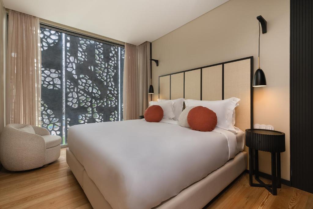 Cama ou camas em um quarto em Artsy Cascais